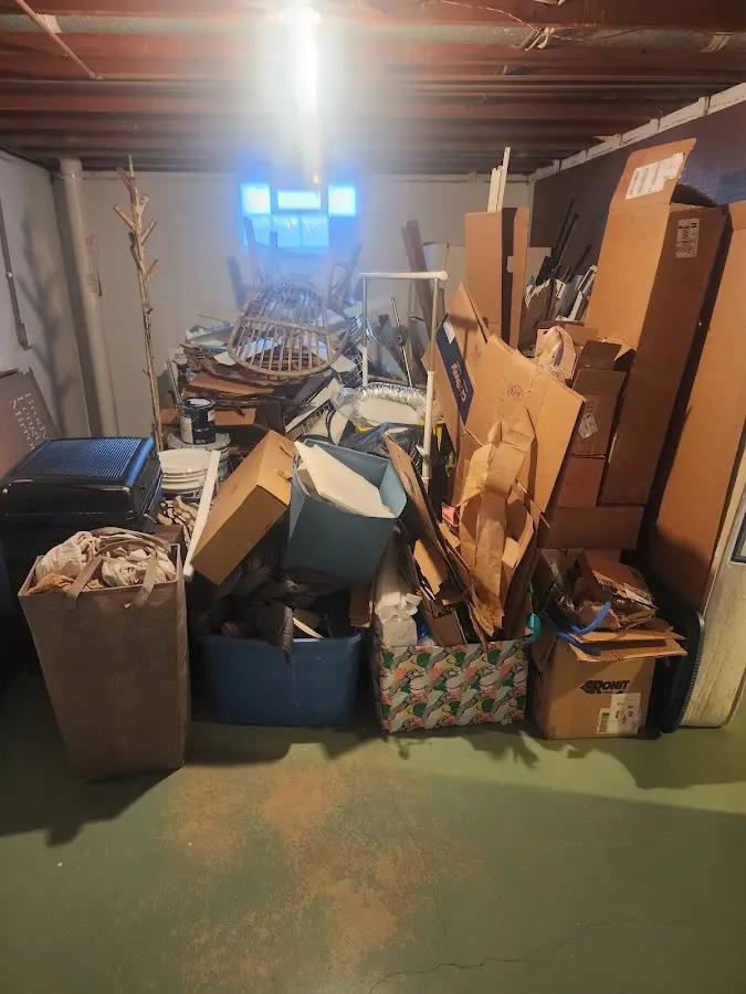 Roll-off dumpster container at job site for 2 Yard Dumpster Rental in White Plains